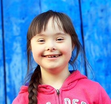 Young girl smile after special needs dentistry visit