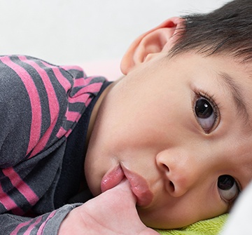 Toddler sucking thumb before treatment for non nutritive habits