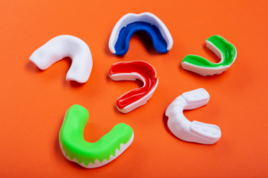 an assortment of colorful athletic mouthguards